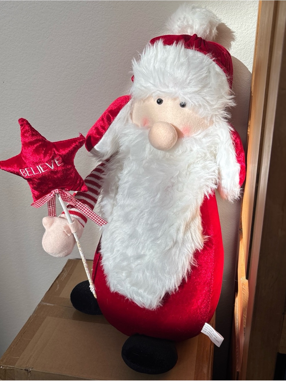 Holiday Red Santa Plush Figure with 'Believe' Star Wand Christmas decoration